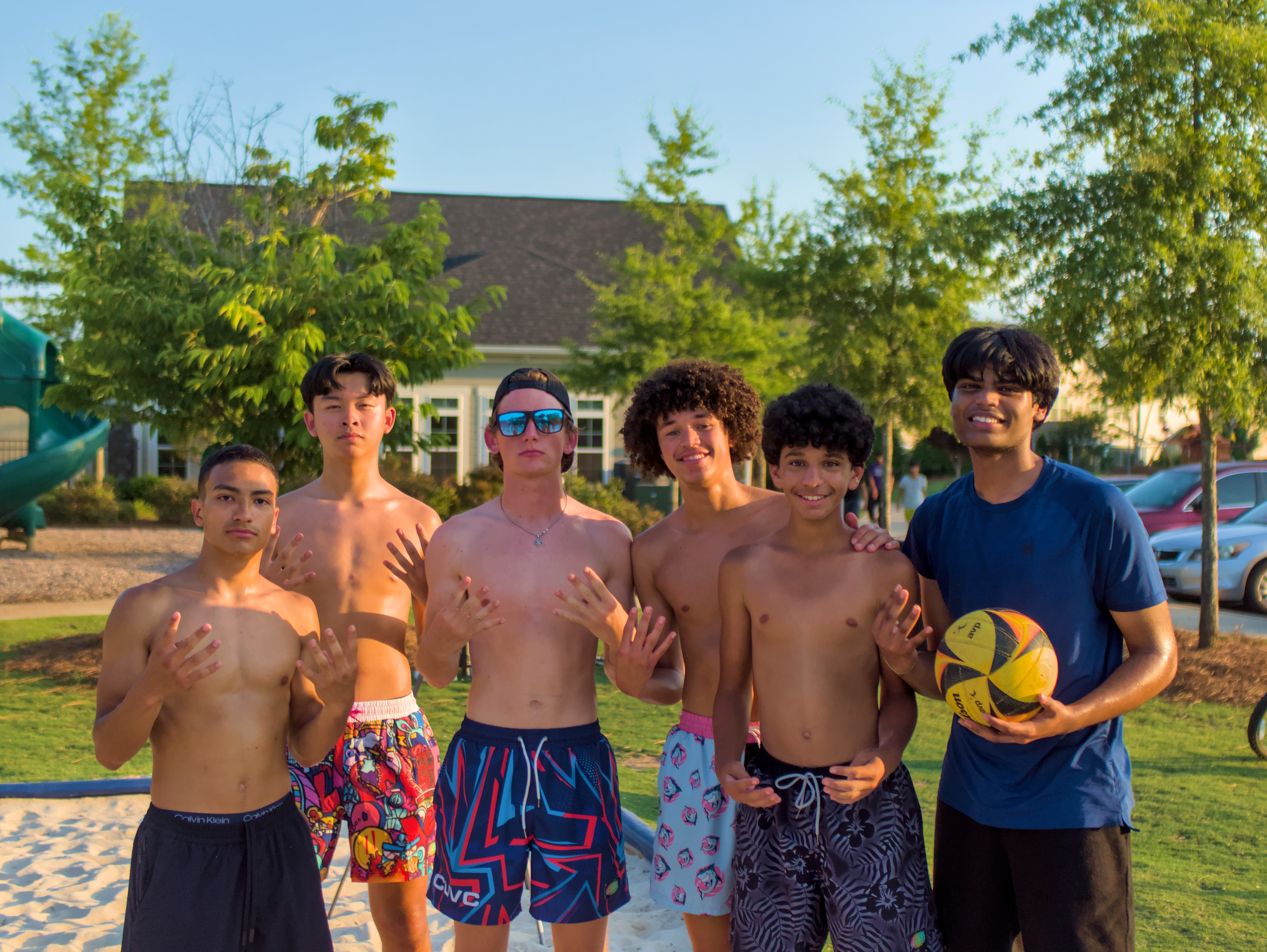 HFF volunteers together at a volleyball event.